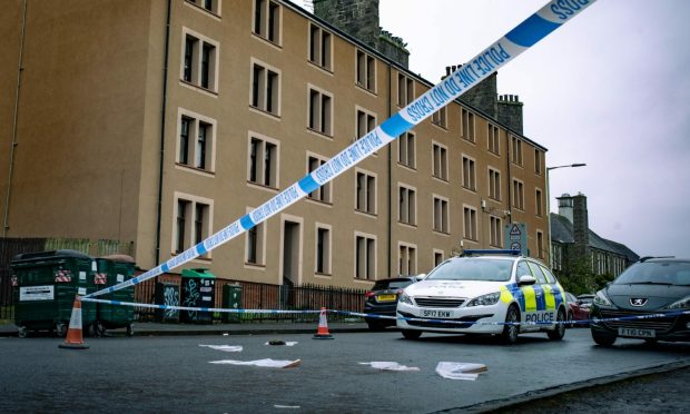 A street in Dundee cordoned off by police.