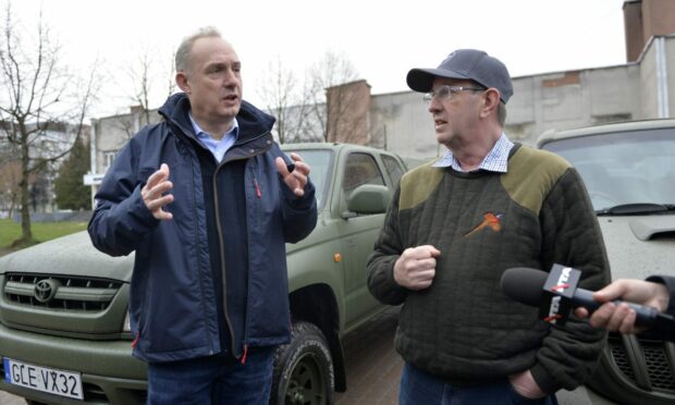James Arnott (right) and Mark Laird of Pick-ups for Peace in Lviv