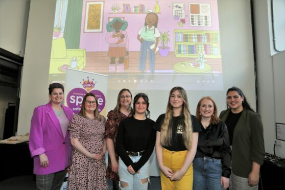 Oor Fierce Girls members Tamsyn and Ashley (front) with the team from The Young Women's Movement, NSPCC Scotland and Dundee City Council. Image: Gareth Jennings.