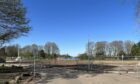 The centre is gone but fencing remains around the old Lochside Leisure Centre site. Image: Graham Brown/DC Thomson.
