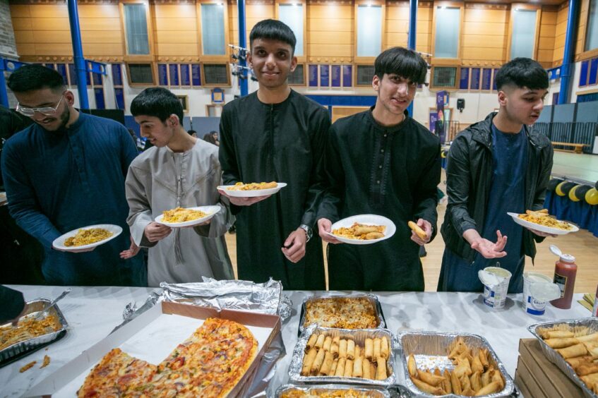 Pupils break their fast together at Morgan Academy's first Iftar party. 