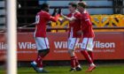 Botti Biabi celebrates with Fraser MacLeod as Brechin City win comfortably against Fraserburgh. Image; Kenny Elrick / DCT Media.