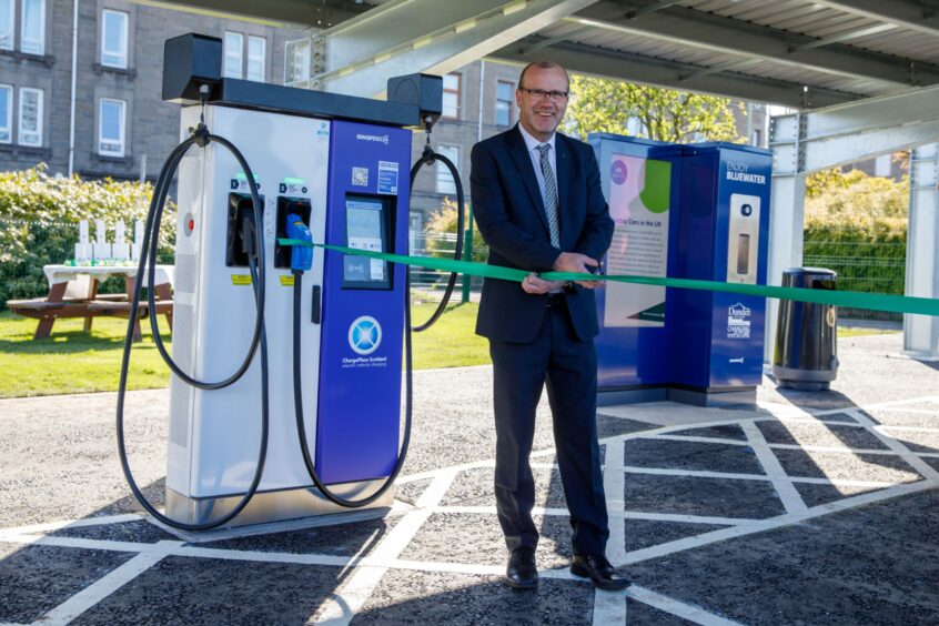 Image shows Mark Flynn at the new Dundee charging hub.