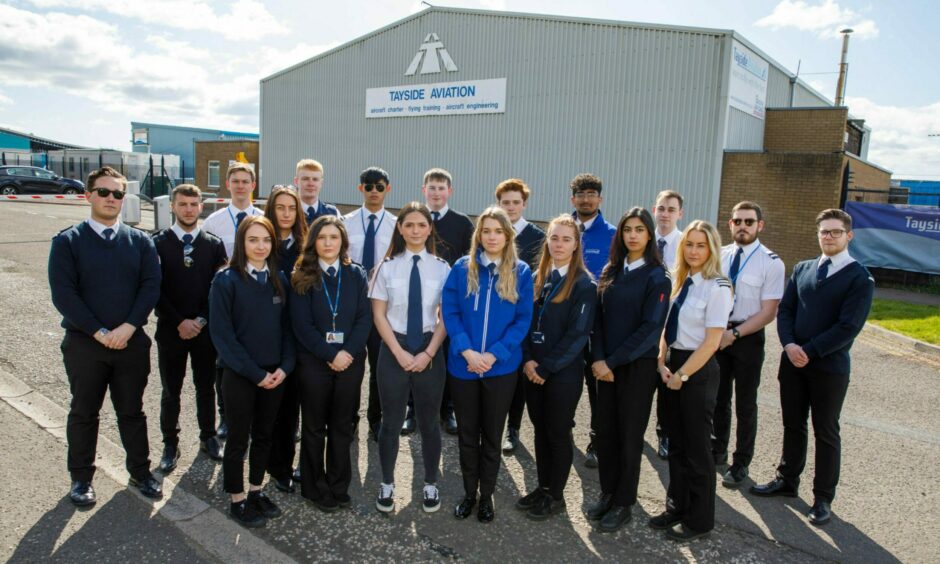 Group of students from Tayside Aviation, which has gone into administration, leaving them thousands of pounds out of pocket. 