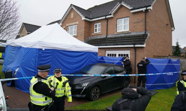 Officers from Police Scotland at the home of Peter Murrell and Nicola Sturgeon. Image: PA/Andrew Milligan.