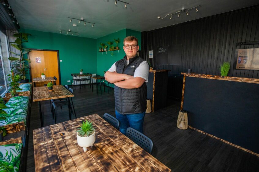 Mateusz in his new cafe. 