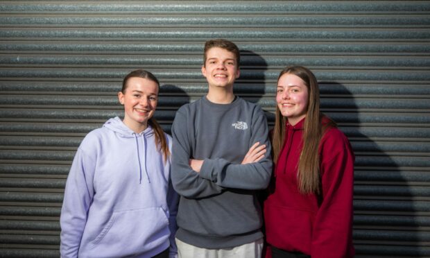 Cast members Millie Turnbull, Fraser Paterson and Hannah Carr from Dundee Youth Music Theatre Oklahoma! show.