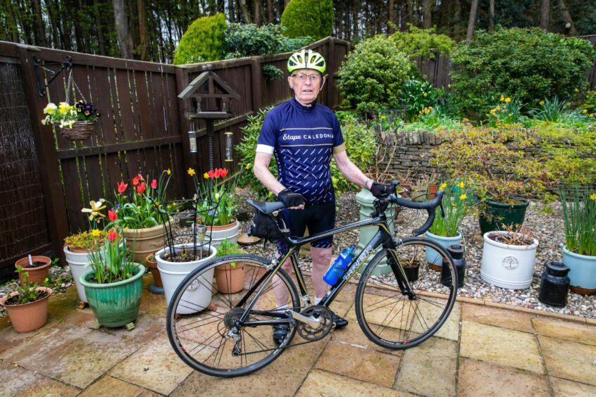 Cupar cyclist John McNally with Etape Caledonia vest at home in Fife.