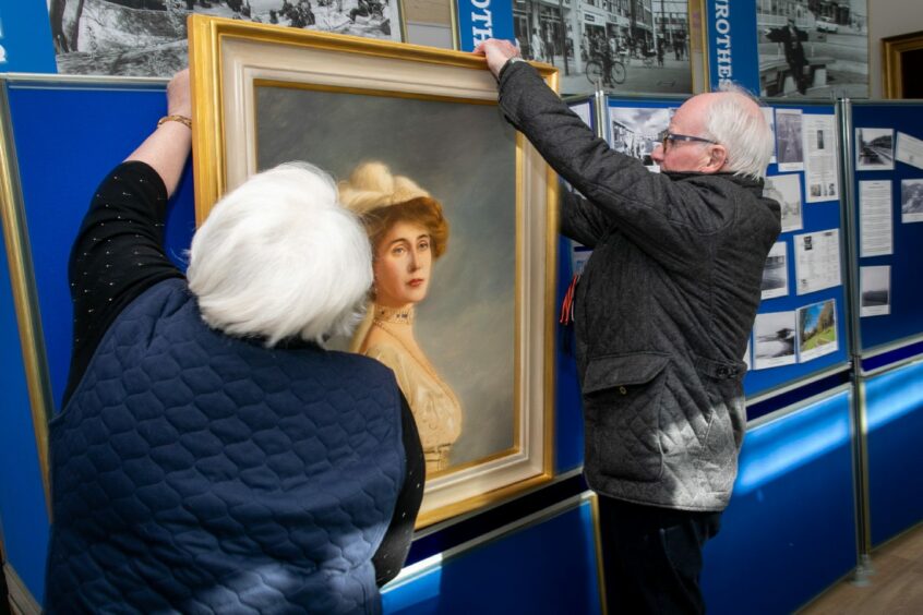 Linda Ballingall and Vice Chair David Brown with a portrait of The Countess of Rothes. 