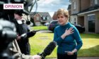 Nicola Sturgeon speaking to reporters outside her home following her husband's arrest.