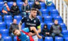 Dundee defender Ryan Sweeney gets above Robbie Deas of Inverness. Image: SNS.