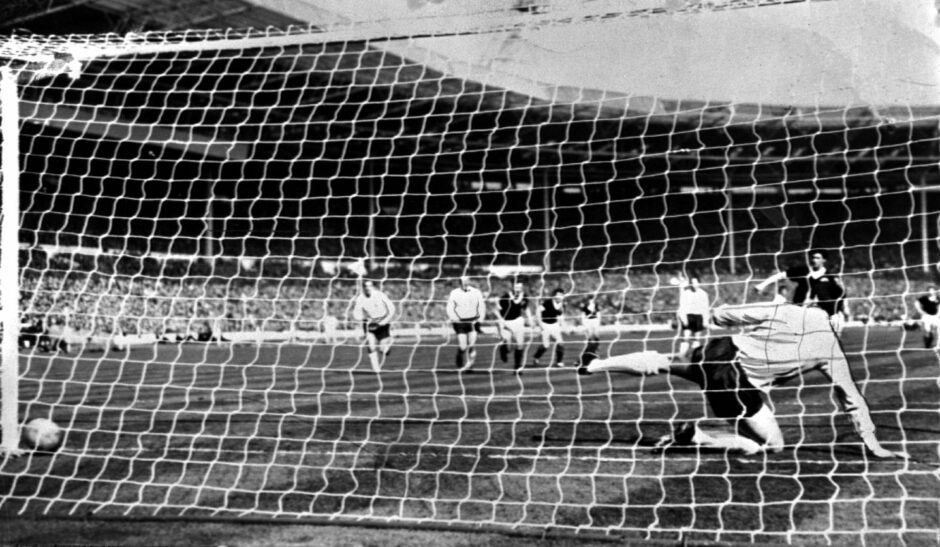 Jim Baxter beats goalkeeper Gordon Banks from the penalty spot to give Scotland a two goal lead. Image: SNS.