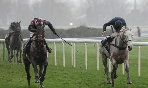 Jimmy Fyffe's horse, Hill Sixteen (left) in action at Aintree in 2021. Image: The Jockey Club Grossick Photography.
