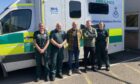 Mal Adams (centre) with ambulance staff Kerry Sweeney, Keith Dickinson, Darren Morrison and Emma Gray.