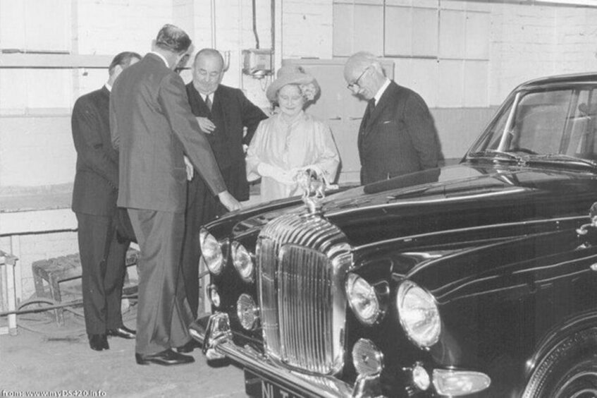Queen Mother pictured next to the Daimler limo.
