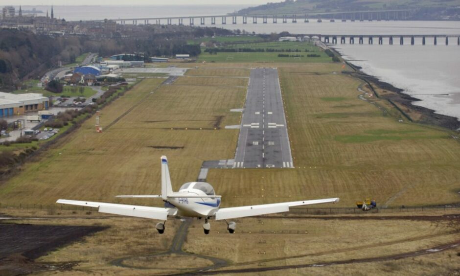 A Tayside Aviation plane preparing to land at Dundee Airport. Image: DC Thomson.