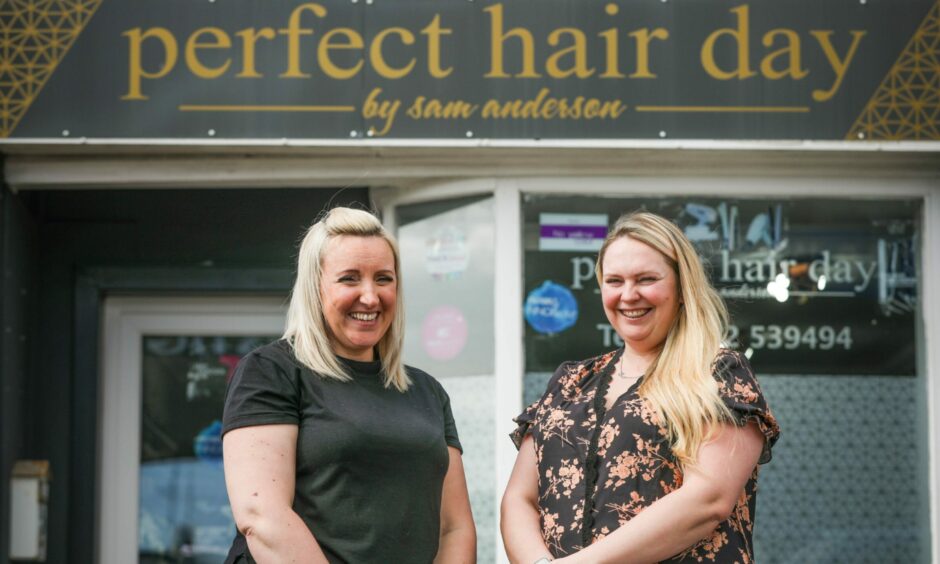 Stylist Tracey Bisland and owner Sam Anderson outside Perfect Hair Day in Monifieth, the salon that is offering free haircuts to those with mental health problems. Image: Mhairi Edwards/DC Thomson.