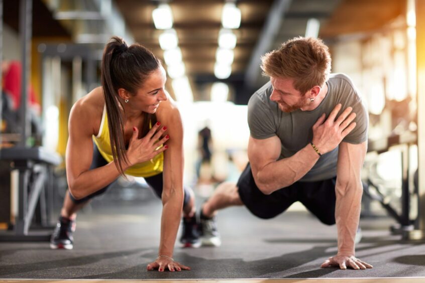 Couple working out together as part of a fun date ideas in Fife.