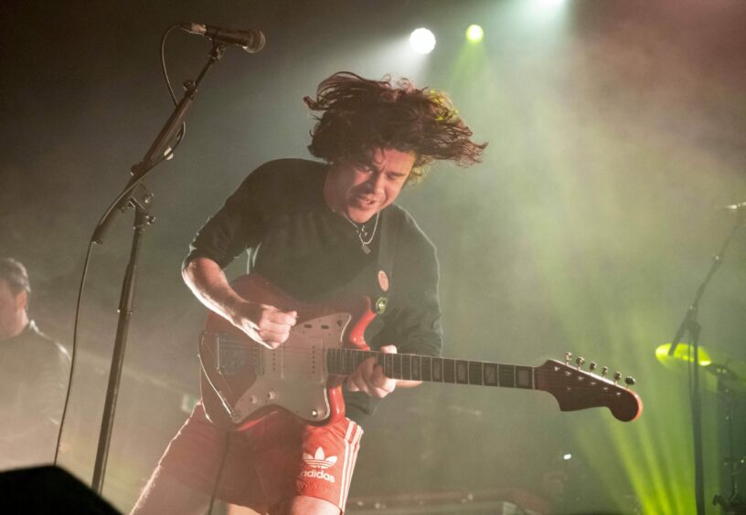 The View frontman Kyle Falconer playing on stage