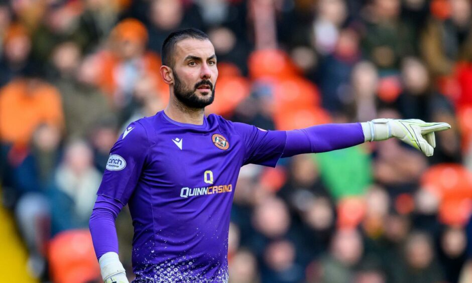 Mark Birighitti in action for Dundee United