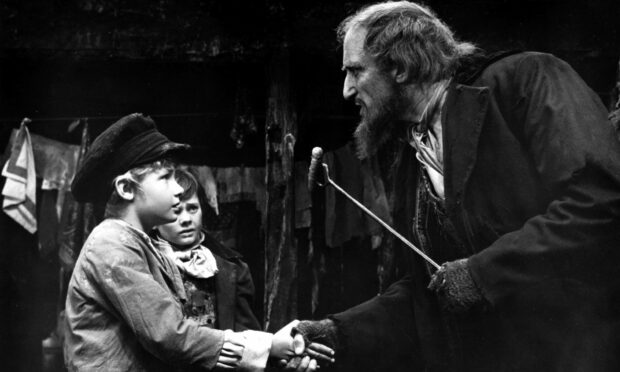 A description of Carr's childhood was like something from Dickens' novel Oliver Twist. Image: Romulus/Warwick/Kobal/Shutterstock
