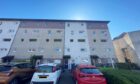 The flat is at Speckled Wood Court in Whitfield. Image: Auction House Scotland