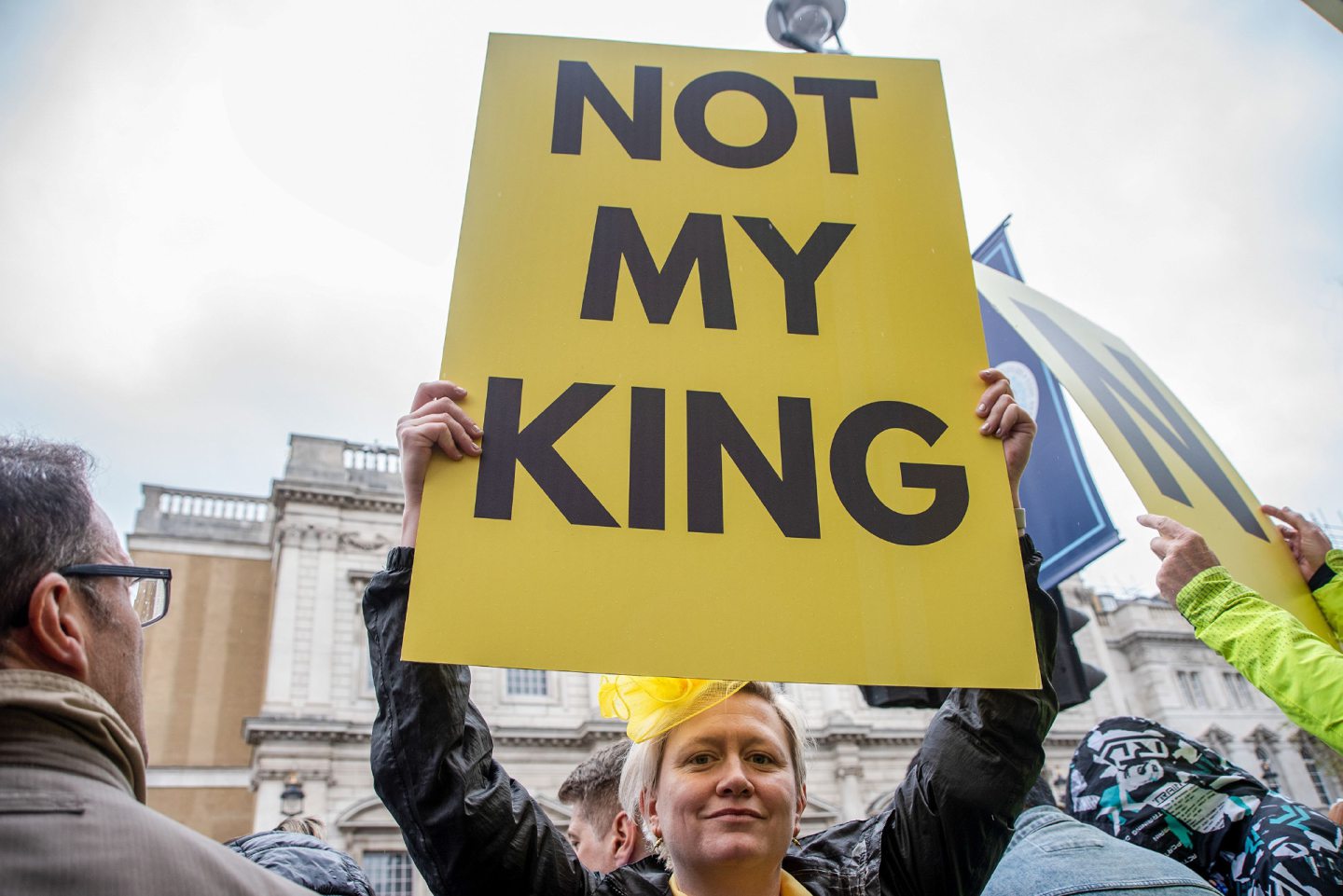 A member of the anti-monarchist protest group Republic holds a placard against King Charles III. Image: Krisztian Elek/SOPA Images/Shutterstock.