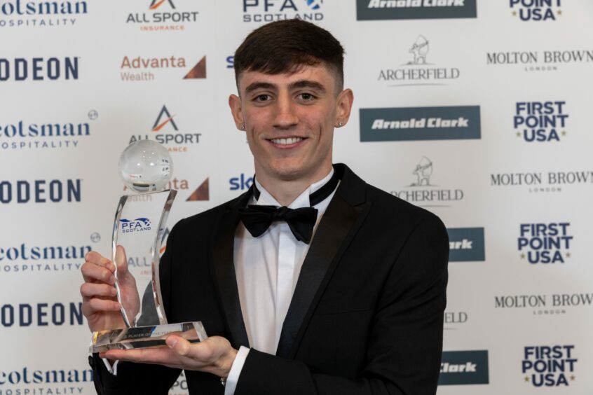 Charlie Reilly with his PFA Scotland League Two Player of the Year award. Image: Shutterstock.