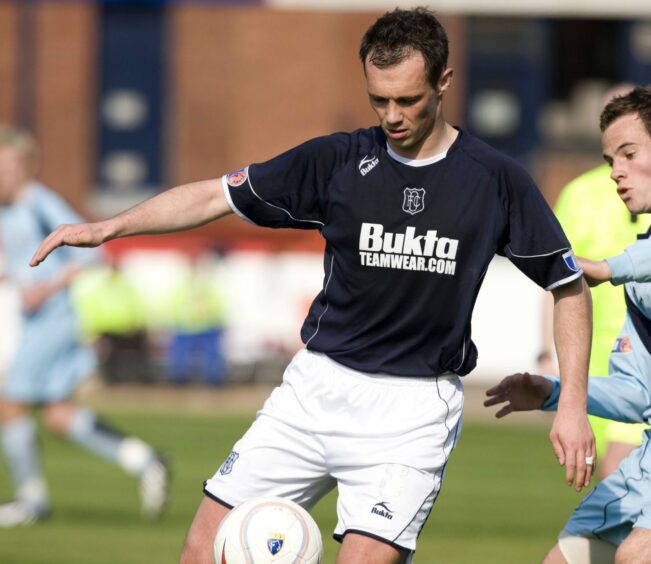 Darren Young in action for Dundee.