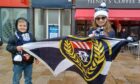 Young fans Abe Egen and Kayla Disbury-Low with a Dundee flag