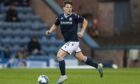 Dundee's Josh Mulligan takes on Cove Rangers. Image: SNS.