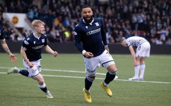 Dundee striker Alex Jakubiak wheels away after opening the scoring against Queen's Park. Image: SNS.