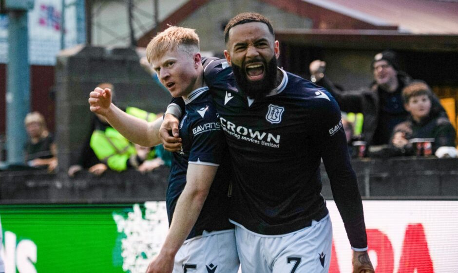 Alex Jakubiak celebrates a goal with team-mate Lyall Cameron during his spell with Dundee.