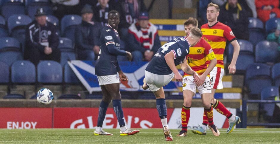 Scott McGill sends in a shot for Raith Rovers.