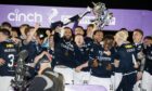 Dundee lift Championship trophy after win over Queen's Park.