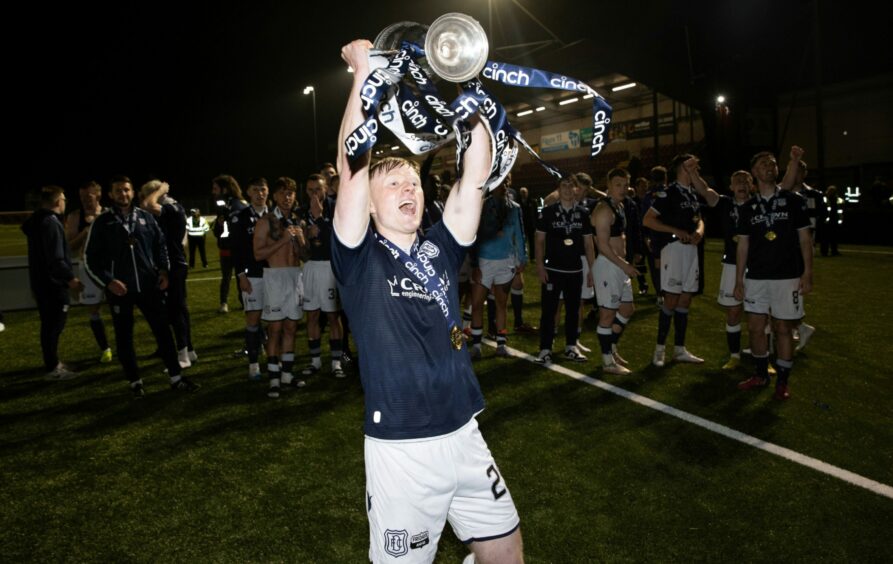 Lyall Cameron, pictured lifting the title trophy, is already signed up for next season. Image: SNS.
