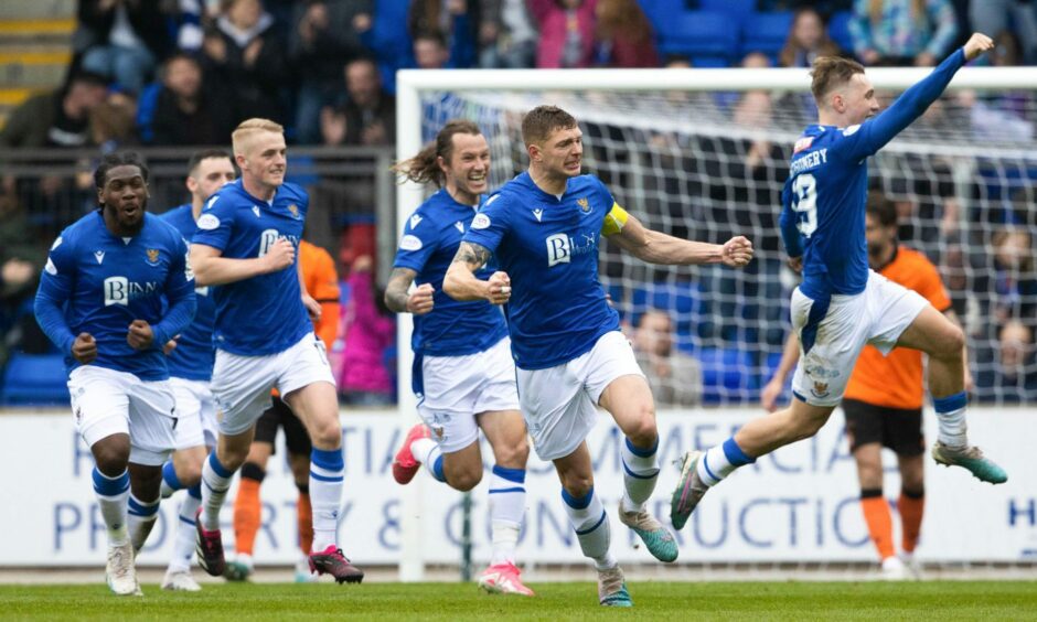 Delight for St Johnstone, as the players celebrate the goal against Dundee United. Image: SNS.