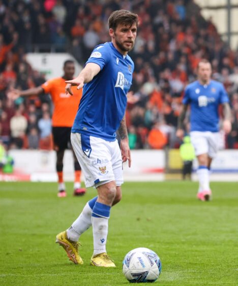 Graham Carey in action against United. 