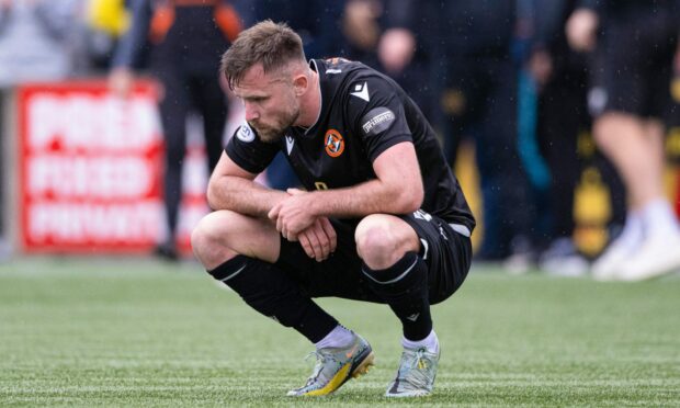 A gutted Scott McMann at full-time following Saturday's 2-1 defeat at Livingston. Image: SNS