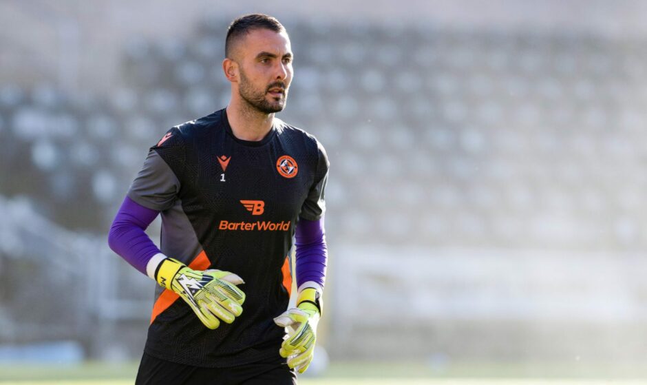 Mark Birighitti playing for Dundee United
