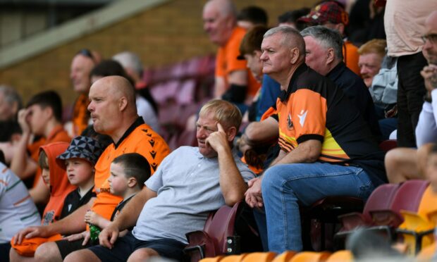 Dejected United fans see their team go down. Image: SNS