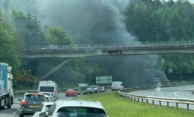 Cars on M90 north of Glenfarg due to vehicle fire.