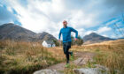 Author Chris Carse Wilson, from Newport-on-Tay in Fife, runs in Glencoe, where he was inspired to write his debut novel, Fray. Picture by Jane Barlow/PA.
