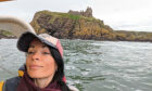 Gayle enjoys views of Dunnottar Castle from the boat.