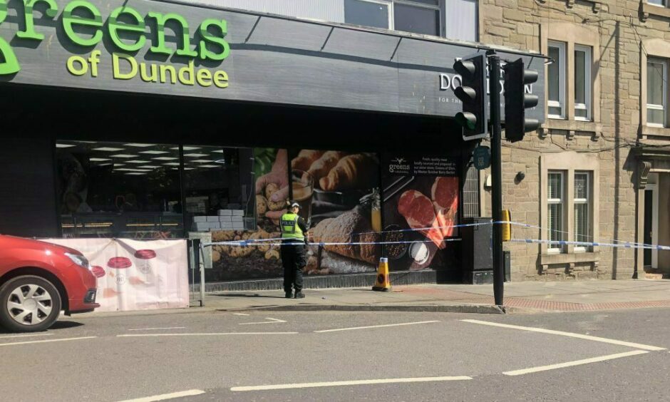 Police on Albert Street in Dundee after a robbery