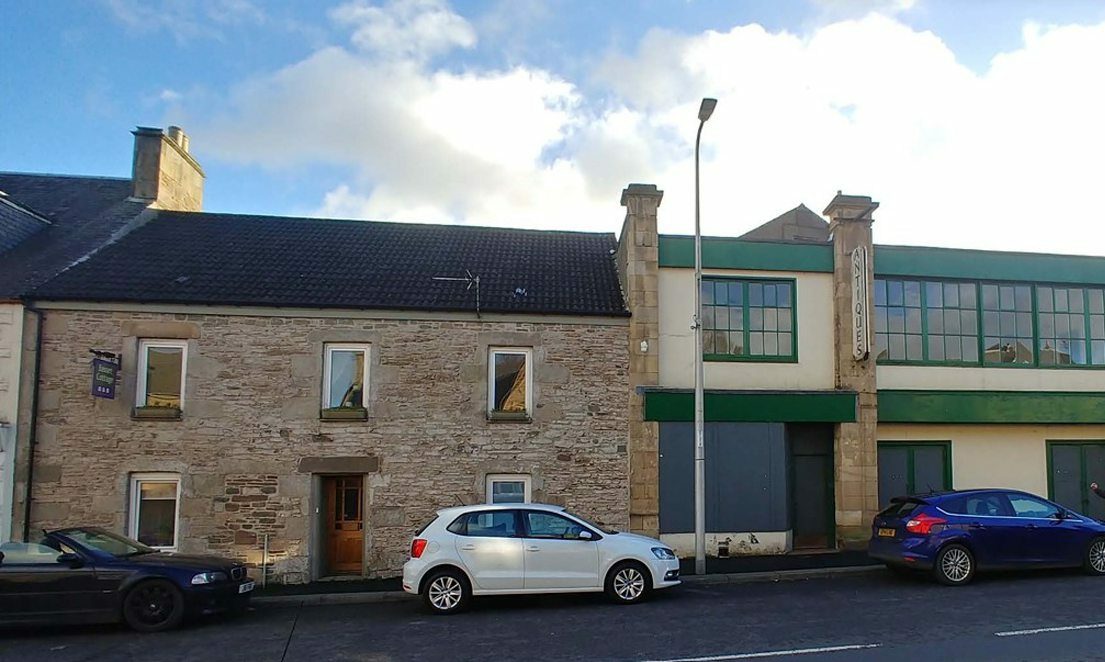 Basset Cottage, left, currently a bed and breakfast, was due to be demolished in the original plans.