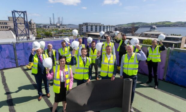 Dundee City Council leader John Alexander with delegates on the rooftop of BT's new state-of-the-art Dundee offices. Image: BT.