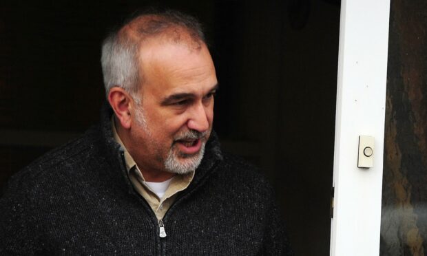 David Bryant at his front door on the first day of the hearing.