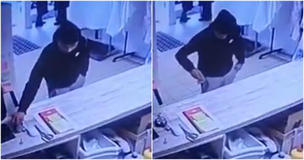 This is the moment a man wearing a black hoodie pocketed a bag of cash from Perth Road laundrette. Image: Supplied