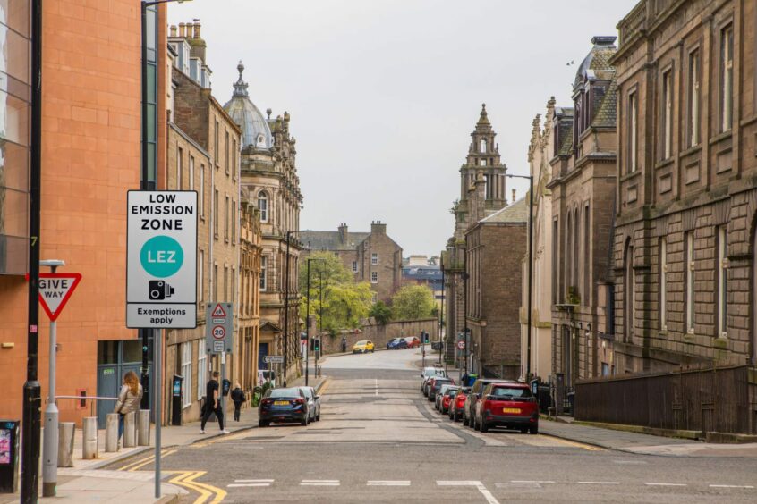 What the Dundee Low Emission Zone could look like. A view of Constitution Road with a sign that reads "Low Emission Zone LEZ Exemptions apply". 